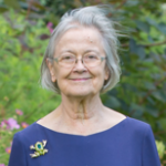 A portrait photograph of Lady Hale in the gardens