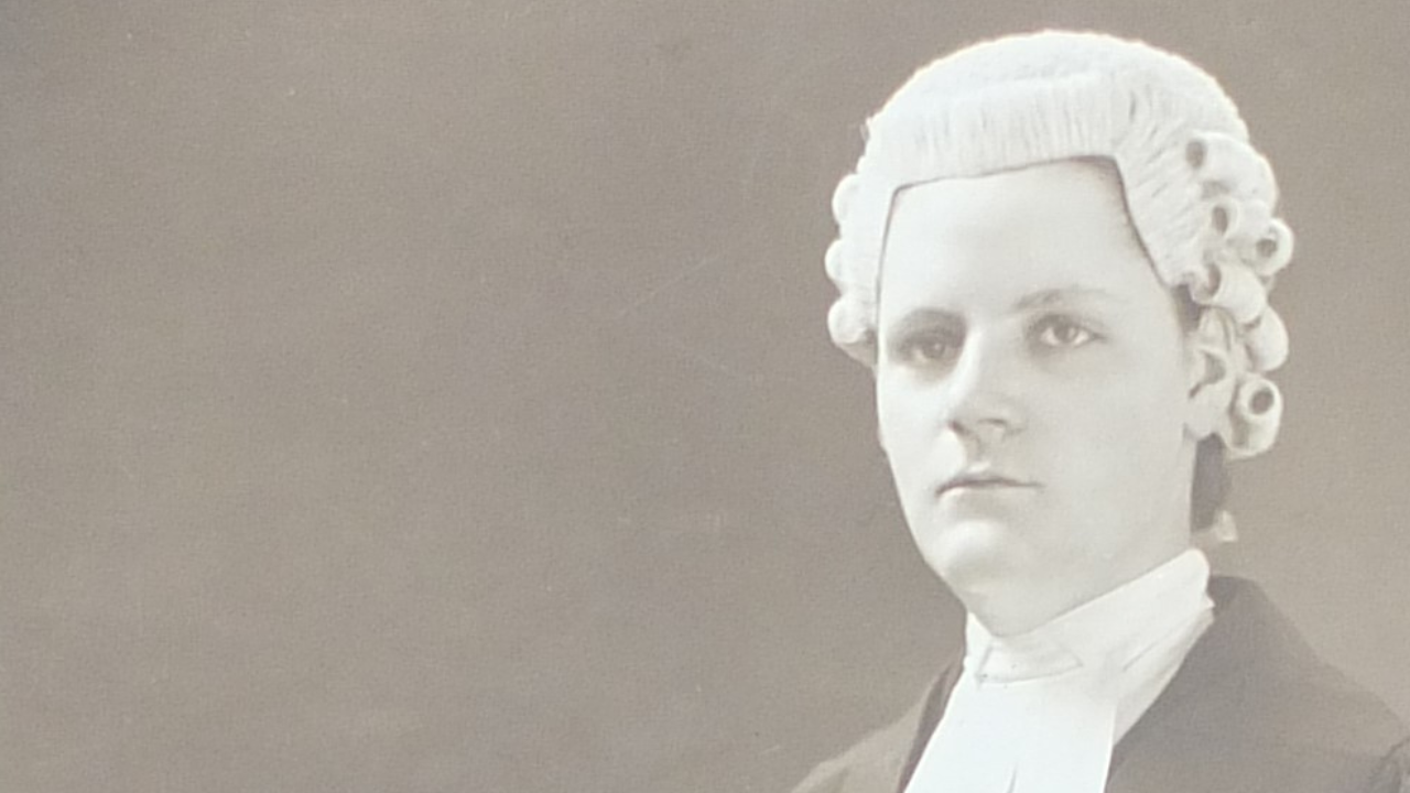 Edith Hesling after being called to the bar having her picture taken dressed in her wig and gown