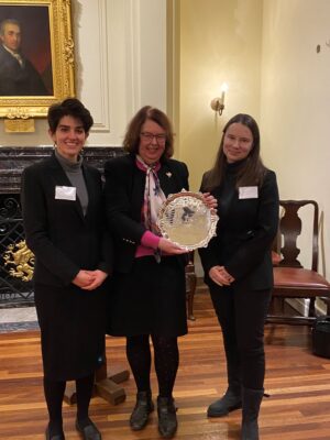 Treasurer Lady Justice Geraldine Andrews presenting the James Hunt Prize to winners Miranda (left) and Carla (right).
