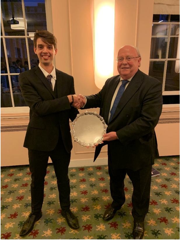 Photograph of Marko Scepanovic 2019 James Hunt Prize Winner with Treasurer William Clegg QC