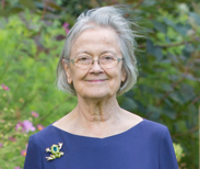 A portrait photograph of Lady Hale in the gardens